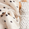 Robe midi à pois – Élégance intemporelle